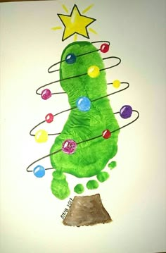 a child's drawing of a green christmas tree