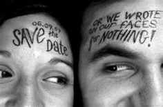 two people with their faces covered in words on their foreheads, one has the word save the date written on his forehead