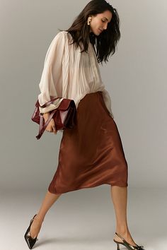 A slip skirt in the truest sense, the on-trend Tilda keeps it simply chic with a French-inspired bias-cut design that makes it drape and move just so . | The Tilda Slip Skirt: Shine Edition by Anthropologie in Brown, Women's, Size: Largearge, Polyester Slip Skirt Outfit, Anthro Style, Satin Short, Simply Chic, Slip Skirt, Skirt Outfit, Trendy Clothes For Women, Lovely Dresses, Bottom Clothes