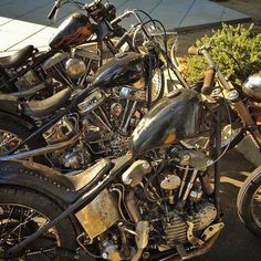 several motorcycles parked next to each other in a parking lot