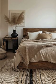 Tranquil Japandi bedroom design showcasing natural materials and light hues Scandinavian Rustic Interior Design, Boho Bedroom Color Palettes, Nomad Bedroom, Brown Wall Bedroom, Tulum Bedroom, Spa Like Bedroom Ideas, Japandi Bed, Bedroom Earthy, Cozy Japandi