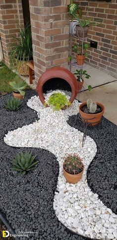 an outdoor garden with rocks and plants