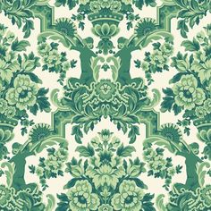 a green and white wallpaper with floral designs on the side, in an ornate pattern