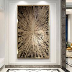 an abstract painting hangs on the wall in a white and black room with marble flooring