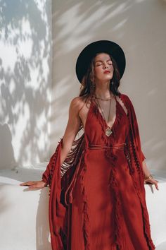 Festival Floor-length Maxi Dress With Tassels, Long Bohemian Dress With Back Tassel Tie-up, V-neck Boho Dress With Tassels For Festival, Festival Maxi Dress With Tassels And Floor Length, Festival Maxi Dress With Tassels And Floor-length, Floor-length Festival Dress With Tassels, Bohemian Maxi Dress With Fringe, Bohemian Floor-length Dresses With Tassels, Bohemian Floor-length Tassel Dresses