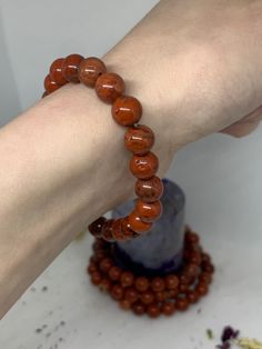 Mesmerizing red jasper bracelets to ground you in your spiritual practice and protect against unwanted energies! Bracelets are approximately 6 mm beads, and do not very in diameter difference (the distance around the wrist in this case).  ‼️ This listing is for ONE red jasper bracelet. If you are interested in multiple please add the desired quantity to your cart. Thank you! ‼️ Red Jasper Chakras : Root, Navel Planets : Mars, Saturn Elements : Fire, Earth Zodiac Signs : Aries, Capricorn Properti Stretchy Beaded Bracelet Red Instead, Healing Jasper Bracelets With 8mm Beads, Spiritual Jasper Bracelets With 8mm Beads, Spiritual Jasper Bracelet With 8mm Beads, Jasper Bracelets For Healing With Round Beads, Red Healing Bracelet With 108 Beads, Healing Jasper Beaded Bracelets With 8mm Beads, Hand-strung Jasper Beaded Bracelets With Round Beads, Earth Zodiac Signs