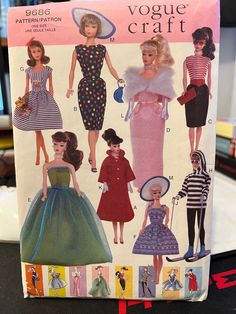 an old fashion book with barbie dolls on it