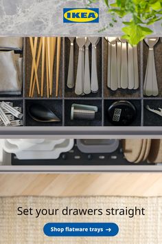 the drawer is full of utensils and other kitchen items that are stored in it