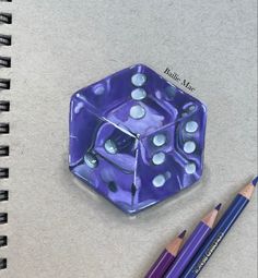 a drawing of a purple dice and two pencils next to it on a table