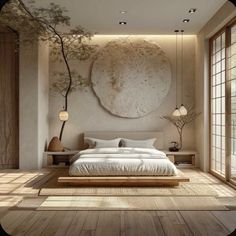 a large bed sitting in the middle of a bedroom next to a tall plant on top of a wooden floor