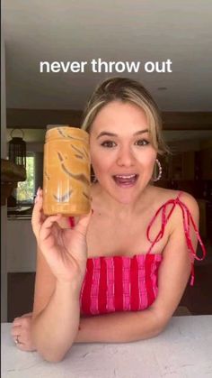 a woman in a pink dress holding up a piece of bread with the words never throw out on it