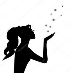 a woman blowing dandelions in the air silhouetted against a white background stock photo