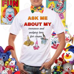 a man standing in front of clowns with his hands on his hips wearing a t - shirt that says, ask me about my immene and hiding love for clowns