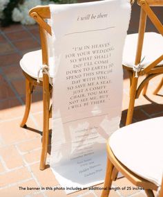 two chairs and a sign that says i am in heaven for your wedding so what comes down to earth?