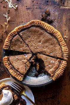 a pie on a plate with a slice missing