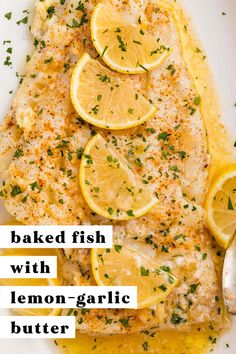 baked fish with lemon - garlic butter on a white plate