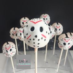 the cake pops are decorated with hockey masks