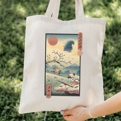 "Our Princess Mononoke inspired 100% cotton bag comes in one size - 15\" x 16\"- perfect for everyday wear. While the canvas material will show off your designs in great colors, it's durable and will last for years. The bag features 20\" handles (made from the same canvas), making it easy to carry even with a week's worth of shopping in Ghibli inspired style! .: 100% cotton canvas .: Heavy fabric (12 oz/yd² (406.9 g/m .: Sewn-in label" Retro Cotton Canvas Travel Bag, White Cotton Bag With Graphic Print, Cotton Shoulder Bag With Graphic Print, Cotton Canvas Shoulder Bag For Gift, Daily Use Cotton Shoulder Bag With Graphic Print, Travel Cotton Shoulder Bag With Graphic Print, Retro Canvas Bag As A Gift, Cotton Retro Shoulder Bag, White Cotton Shoulder Bag With Graphic Print