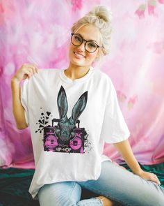 39.00 USD COMFORT COLORS Hip Hop Shirt - Music Lover Unisex Tee Shirt - Easter Gifts - Boys Bunny Tee - Easter Day - Hipster Bunny Gift - Cute Bunny Pull the "cutesie" out of your Easter wardrobe this year...and hunt those eggs in style! This is a fun, hop hop design featuring a totally kickin' rabbitin front of a boombox that reads "Hip Hop". Great for Easter or to wear year round! Comfort Colors introduces its garment-dyed t-shirt; a fully customizable tee made 100% with ring-spun cotton. Hip Hop Shirts, Bunny Gifts, Easter Day, Music Lover, Easter Gifts, Cute Bunny, Dye T Shirt, Music Lovers, Gifts For Boys