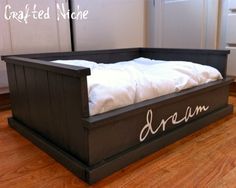 a bed with the name dream written on it