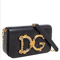 Dolce Gabbana Small Crossbody Bag In Black Leather & Gold-Tone Hardware, With Removable Shoulder Strap, Fold Over Flap With Magnetic Closure. New, With Original Tags And Authentication Cards And Dust Bag. Fast Shipping Black Wallet On Chain With Gold-tone Logo For Evening, Elegant Shoulder Bag With Gold-tone Logo Plaque For Evening, Elegant Clutch With Gold-tone Logo Plaque, Luxury Gold Wallet On Chain With Branded Hardware, High-end Evening Bag With Gold-tone Logo Plaque, Elegant Crossbody Shoulder Bag With Gold-tone Logo, High-end Evening Bags With Gold-tone Logo Plaque, Designer Party Bags With Metal Logo, Luxury Party Bags With Metal Logo