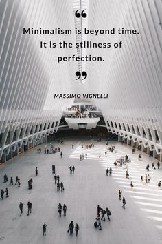 people are walking in the middle of a building with a quote on it that says,'minimalism is beyond time it is the stillness of perfectionion