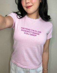 💖 Hating Taylor Music Doesn't Make You Deep - Y2K Baby Tee - Unisex - 100% Cotton 💖 For all the Swifties out there, this Y2K-inspired baby tee is the ultimate clapback to anyone who thinks dissing Taylor equals depth. Featuring bold fonts, this y2k style tee blends nostalgia with a tongue-in-cheek statement that every true Taylor fan will appreciate. Crafted from 100% ethically sourced cotton, it's a perfect mix of comfort, sustainability, and style. Whether you're repping for your favorite ar Taylor Swift Baby Tee, Funny Baby Tees Women, Y2k Slogan Tee, Infant Tees Y2k, Funny Baby Tees Y2k, Swiftie Shirt, 90s Gift, 90s Fits, 90s Y2k Fashion