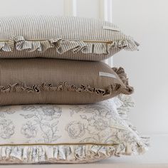 three pillows stacked on top of each other