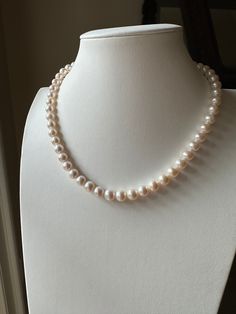 These pearls are all natural in color, not treated, dyed or enhanced in anyway. Please confirm with us if the item is still available before your place an order. Thank you! Shape: round Size: 8-8.5mm Color: as pictured.  Colors may vary due to viewing on different display, devices. Please reach out to us for more pictures  or videos Luster: very strong  Blemish: very slightly In stock. Can be shipped in 1-3 business days. Pearl White Single Strand Pearl Necklace, Pearl Necklaces With 8mm Round Beads, Pearl White Necklaces With 8mm Round Beads, Single Strand Round Pearl Necklace, Keshi Pearl Necklace, Akoya Pearl Necklace, Pearl Strands Necklace, Pearl Strand, Vintage Choker