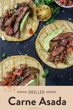 three steak tacos on tortillas with salsa, avocado and tomatoes