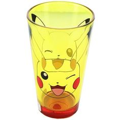 a yellow glass with pikachu on it's face and eyes, sitting in front of a white background