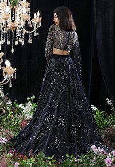 Editor's Note Black Satin Organza Embroidered Trail Lehenga, Embroidered Blouse With Tassel Organza Dupatta Fabric: Satin Organza, Net And Organza Color: Black Care: Dry Clean Only About the Designer Mahima Mahajan has injected a breath of fresh air into the Indian fashion industry with her bespoke collection of decorous designs. Her approach to designing can be described as both fashionable as well as functional. The designs applied by Mahima Mahajan portray a typical Indian fondness that blend Luxury Floor-length Black Choli, Black Sequin Lehenga, Sangeet Outfit Bridal, Trail Lehenga, Mahima Mahajan, Sequin Lehenga, Sangeet Outfit, Fancy Wedding Dresses, Embroidered Lehenga