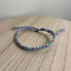 A Handmade Bracelet Or Anklet Woven With Shades Of Gray, Green, And Purple Colors. A Friendship Or Statement Bracelet Perfect For This Summer! Approx. 9 Inches/ 30 Centimeters Long. 10 Woven Bracelets For $25. Mermaid Colors, Dainty Gold Bracelet, Purple Bracelet, Snap Bracelets, Swarovski Bracelet, Woven Bracelet, Multi Strand Bracelet, Diamond Bangles Bracelet, Mermaid Coloring