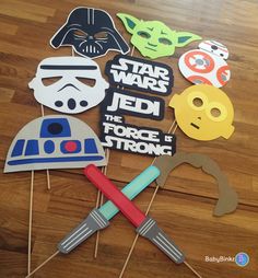 star wars cupcake toppers and picks on a wooden table