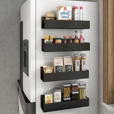 a refrigerator with some shelves on it in a kitchen