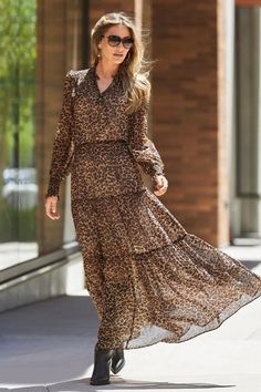 Style: Flowy, fierce, and sophisticated animal print dress sends out boho-chic vibes in an effortless long-sleeve maxi silhouette designed with chic tiers. Smocking details at cuff, waist, and shoulder, finished with a delicate ruffle collar, create feminine shape and a comfortable fit. Separate slip lining. Occasion: Daytime Chic, Work, Weekend Material: Polyester Casual Glam, Animal Print Dress, Ruffle Collar, Tiered Maxi Dress