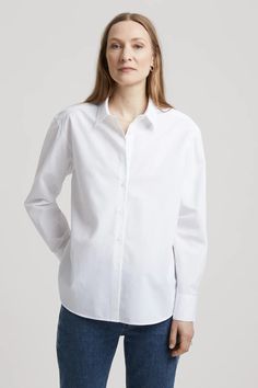 Oversized Classic Cotton Blouse, Classic Oversized Shirt For Daywear, Classic Oversized Cotton Blouse, Oversized Cotton Shirt In Effortless Style, Effortless Long Sleeve Cotton Shirt, Oversized Classic Blouse, Classic Oversized Blouse, Effortless Cotton Blouse With Shirttail Hem, Relaxed Fit Long Sleeve Dress Shirt For Everyday