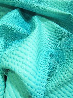 a close up view of a blue fabric