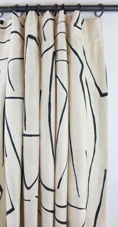 a curtain with black lines drawn on it