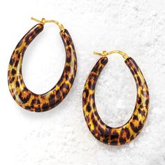 Ross-Simons - Italian Leopard-Print Enamel Hoop Earrings Over Sterling. 1 3/4". Unleash your wild side with these fierce hoop earrings. Crafted in Italy, the statement-making pair features leopard-print enamel in polished 18kt yellow gold over sterling silver. A classic style with a comfortable weight. Hanging length is 1 3/4". Snap-bar, leopard-print enamel hoop earrings. Leopard Earrings, Ear Piercings, Piercings, Leopard Print, Classic Style, Gold Bracelet, Fine Jewelry, Hoop Earrings, Yellow Gold