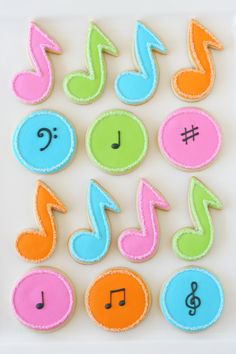 colorful decorated cookies with musical notes on them