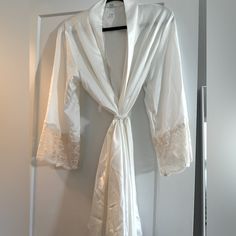 Never Worn Silk Robe With Lace Details - Perfect For Wedding Day Festivities Or If You Just Love Luxurious Robes White Lace Trim Robe For Wedding Night, White Robe With Lace Trim For Wedding Night, White Fitted Sleepwear For Wedding Night, White Lace Trim Wedding Sleepwear, Cream Lace-trim Sleepwear For Wedding, Fitted Cream Robe For Wedding, Cream Wedding Sleepwear With Lace Trim, Fitted Cream Wedding Robe, Fitted Satin Sleepwear For Wedding