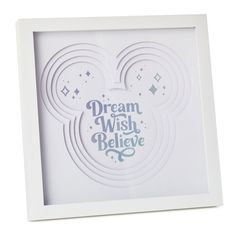 a mickey mouse photo frame with the words dream and wish believe in blue on it