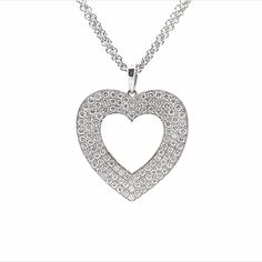 Simple and classic, this white gold heart pendant is a staple for every woman’s wardrobe. It features 114 diamonds that offer enduring sparkle. 1.46ct 114 Diamonds Set in White Gold Luxury White Gold Heart Cut Diamond Necklace, Luxury Heart Cut Diamond Necklace With Accents, Luxury Heart Cut Necklaces With Pave Setting, Luxury Heart Cut Necklace With Pave Setting, Luxury Diamond White Heart Cut Diamond Necklace, Luxury Heart Cut Brilliant Diamond Necklace, Luxury Heart Cut Diamond Necklace With Brilliant Cut, Luxury Heart Cut Diamond Necklace With Single Cuts, Luxury Heart Shaped Brilliant Cut Diamond Necklace