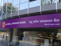 a purple and white sign that says mumbai finance bank