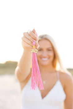 Pink Cap and Gown | Female Beach Poses | Beach Senior Session | Beach Photography Senior Picture Ideas With Tassel, Pink Cap And Gown Pictures, Senior Picture Asthetics, Senior Pictures With Tassel, Girly Graduation Pictures, Senior Picture Ideas Charleston, Hs Senior Picture Ideas, Highschool Grad Pics, Spring Senior Photoshoot Ideas