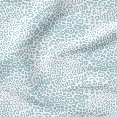 a blue and white animal print fabric