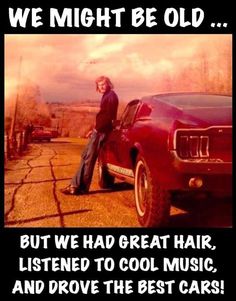 a man leaning on the hood of a red car in front of a sign that says, we might be old but we had great hair, listened to cool music, and drove the best cars