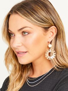 These shiny floral earrings elevate any outfit! Add these statement earrings to a flowy dress and some wedges for a complete look! Elegant Spring Hoop Earrings, Chic Gold Flower Earrings For Summer, Elegant Flower Earrings For Beach, Chic Spring Party Hoop Earrings, Chic Drop Earrings For Spring, Chic Summer Hoop Earrings, Feminine Summer Flower Drop Earrings, Chic Drop Earrings, Spring Flower Earrings For Parties