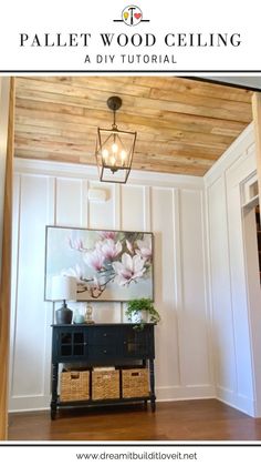 a room with white walls and wood ceiling